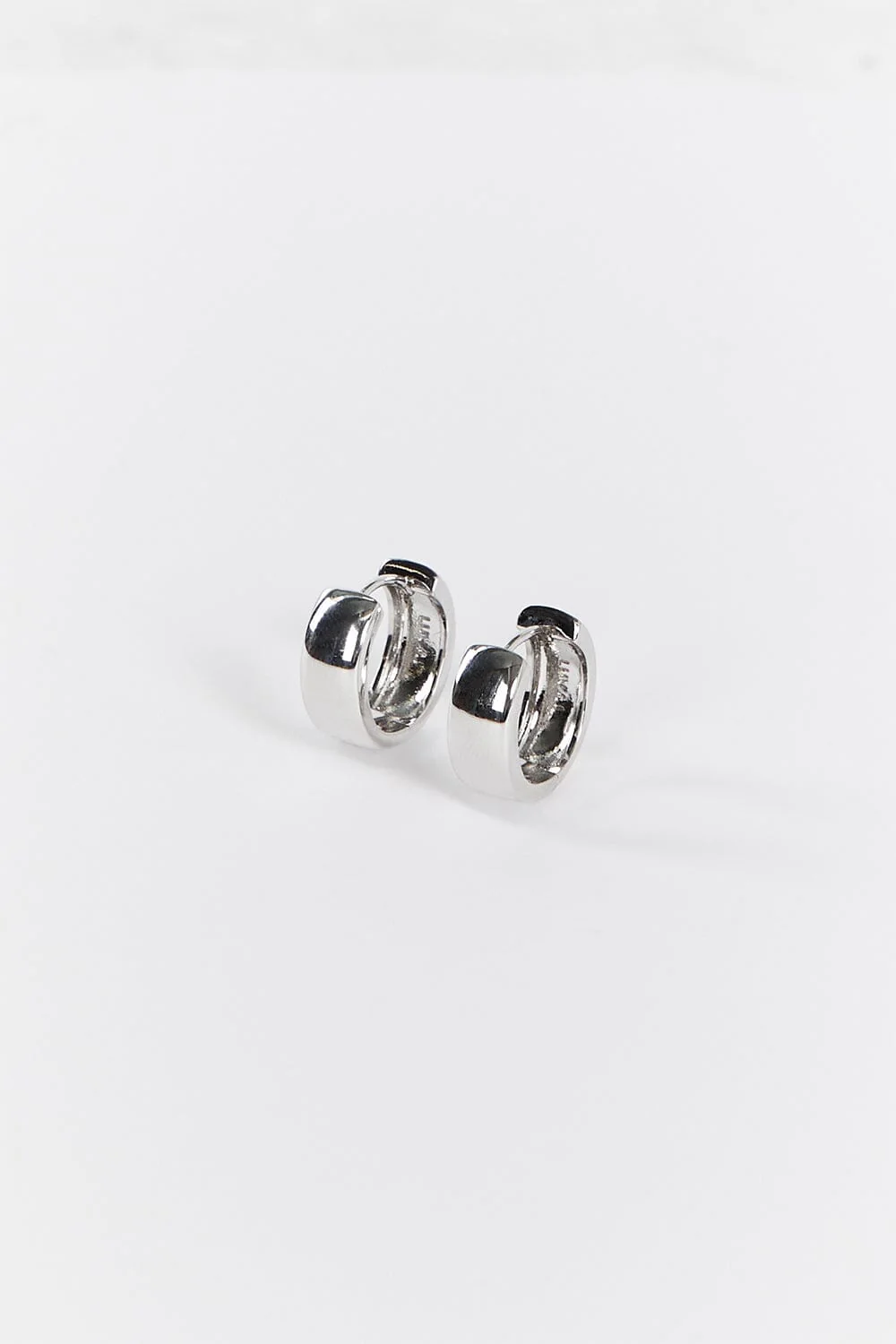 LUV AJ MONACO SILVER HUGGIES EARRINGS - Image 2